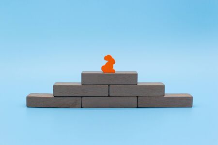 One winner at the top of the pyramid, the concept of leadership and solitude