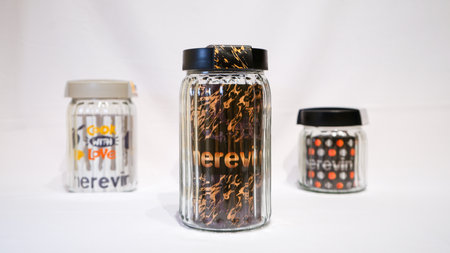 Black and Grey Plastic Sealed Twist Glass Jars are a sleek and stylish storage solution for any home. These jars feature a unique twist pattern on the glass body and come with black and grey plastic lids that seal tightly to keep contents fresh and secure.の写真素材