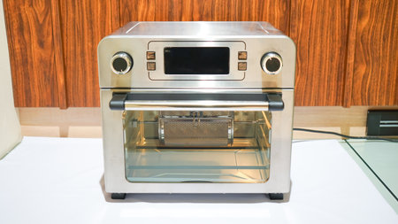 Electric Rotisserie Chicken Oven Grill Machine is a powerful and efficient appliance designed to roast chicken, turkey, and other meats evenly.の素材 [FY310204618380]