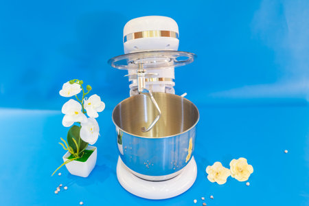 The Blue Accented White Cake Mixer is a perfect companion for all your baking needs.の写真素材