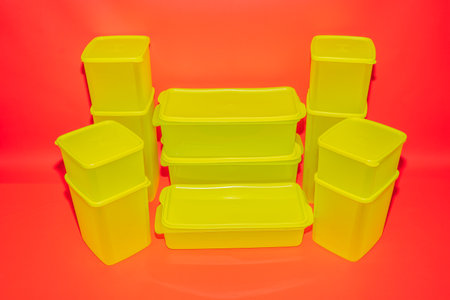The Yellow Plastic Box Jars in Various Sizes offer versatile storage solutions for your needs.の写真素材