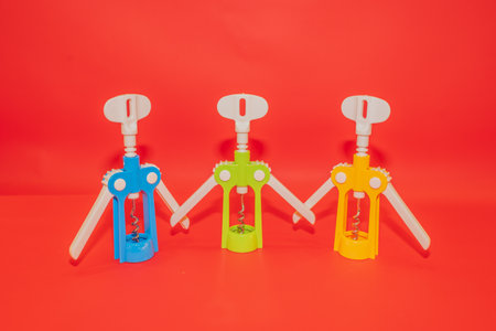 The Colorful Wine Opener is a vibrant and stylish wine accessory that adds a pop of color to your wine collection.の写真素材