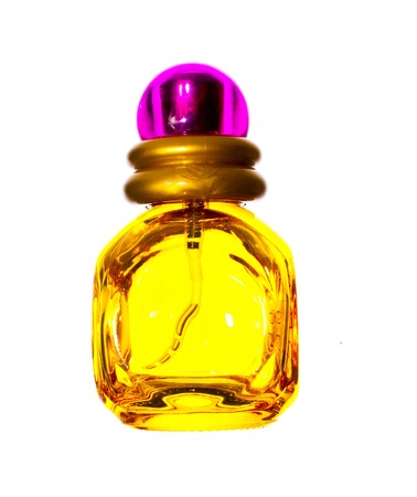 yellow perfume isolated on whiteの写真素材