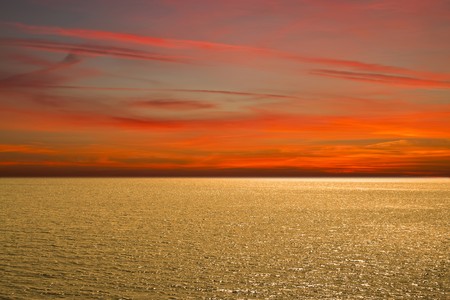 Sunset at coast of the seaの写真素材