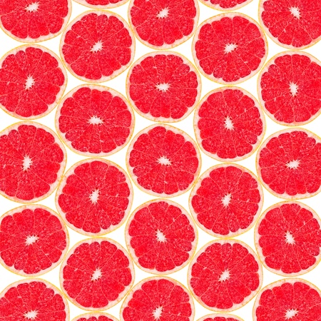 Background from parts of fresh, juicy grapefruitの写真素材