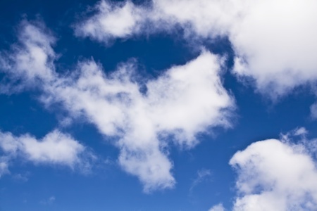 white fluffy clouds in the blue sky
