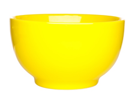 Yellow ceramic bowl on white backgroundの写真素材