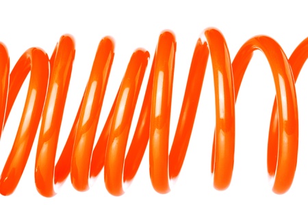 Plastic spring isolated on white backgroundの写真素材