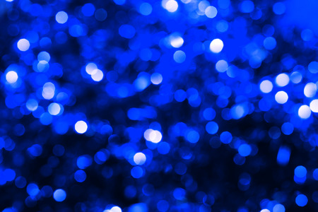 Defocused abstract blue christmas backgroundの写真素材
