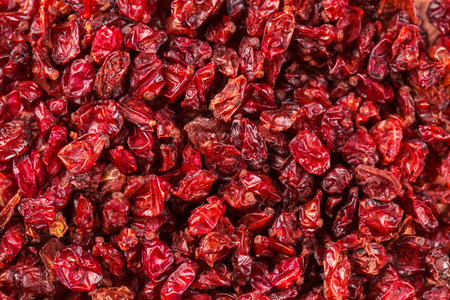 Dried red Tibetan spicy barberries placer backgroundの写真素材