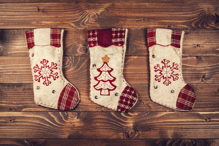 Christmas socks on a wooden backgroundの写真素材