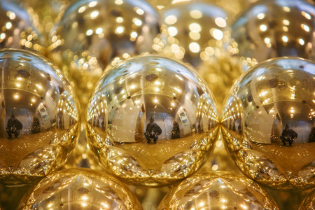 Golden Christmas balls backgroundの写真素材