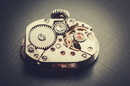 mechanism antique vintage wrist watch beautiful original black and metallic backgroundの写真素材