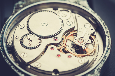mechanism antique vintage wrist watch beautiful original black and metallic backgroundの写真素材