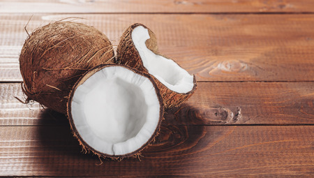 Coconut on wooden background
