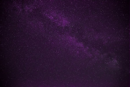 Colorful space shot showing the universe milky way galaxy with stars and space dust.