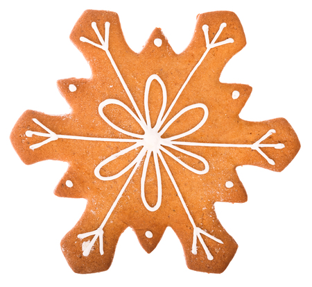 Beautiful and delicious gingerbread Christmas gingerbread snowflake isolated on white backgroundの写真素材