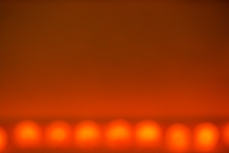 Defocused gold abstract Christmas Glitter Lights bokeh Backgroundの写真素材