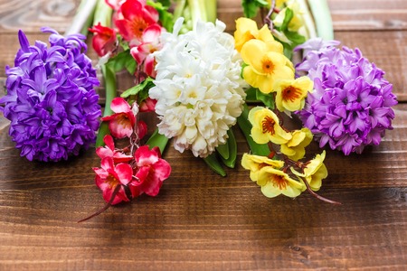 Fresh hyacinth flowers on wooden background. Beautiful idea for greeting cards for Valentine's day, March 8 and mother's dayの写真素材