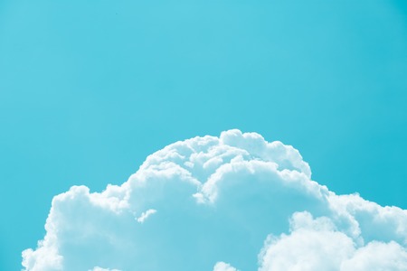 White fluffy clouds in the blue skyの写真素材