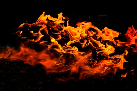 Beautiful burning fire flame background and coalsの写真素材