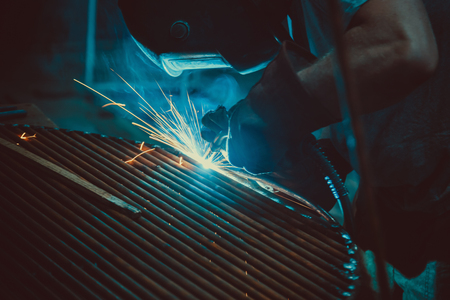 Welding Work. Erecting Technical Steel Industrial Steel Welder In Factory. Craftsman. Soft focus....