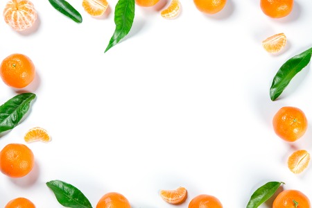 Ripe Orange Tangerine (Mandarin) With Leaves Close-up On The White Background.の写真素材