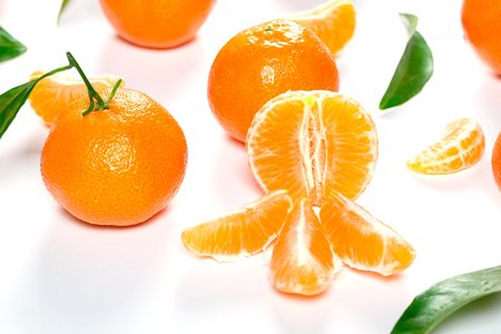 Ripe Orange Tangerine (Mandarin) With Leaves Close-up On The White Background.の写真素材