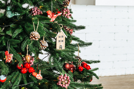 Christmas living room with Christmas tree and gifts under itの写真素材
