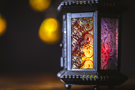 The Muslim feast of the holy month of Ramadan Kareem. Beautiful background with a shining lantern Fanus. Free space for your text.の写真素材