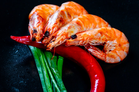 Grilled prawns with chili pepper. Royal delicious and beautiful shrimp. Flatley. Food backgroundの写真素材