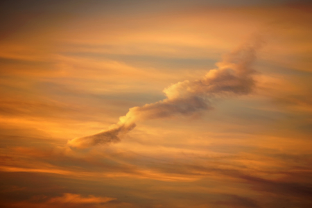 he sky after sunset with dramatic clouds backgroundの写真素材
