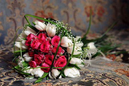 Bouquet of flowers of the bride pink roses and white tulipsの写真素材