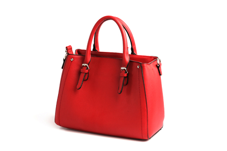 Red elegant female bag with two handles on white background isolatedの写真素材