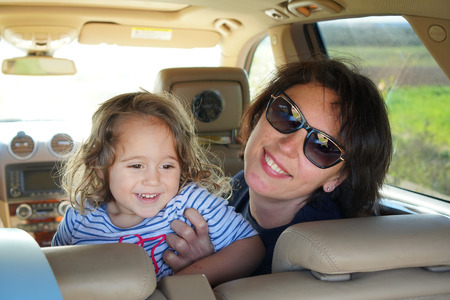 mom and daughter ready to leave for holidayの写真素材