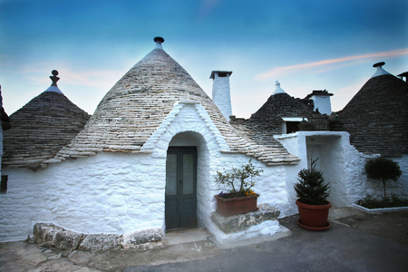 Trulli in Alberobello at sunset - Apulia - Italyの写真素材