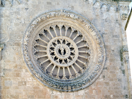 rose window of the cathedral of Ostuni closeup , Puglia, Italyの写真素材