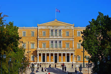 Athens, Greece - October 06, 2014 People walking in Syntagma square with the Greek parliament building as a backgroundのeditorial素材