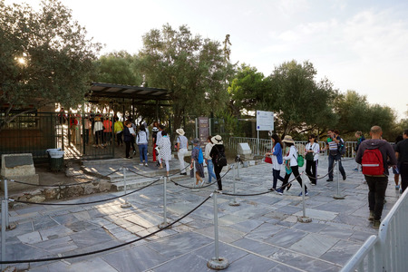 Athens, Greece - October 05, 2018 First tourists visiting the Parthenon
