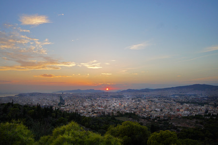 Beautifull sunset on Athens from FILOPAPPOU HILLの写真素材