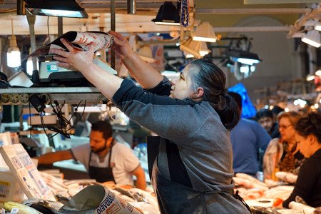 05 OCTOBER 2018, ATHENS, GREECE Customers make purchases in the Central fish marketのeditorial素材