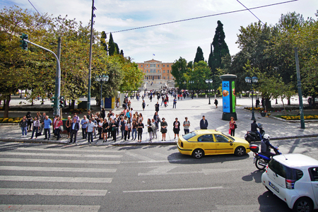 GREECE, ATHENS - OCTOBER 05 People waiting pass through the pedestrian crossing, near Ermou streetのeditorial素材