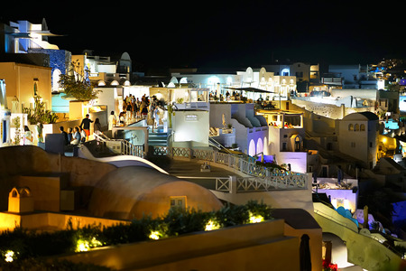 Santorini, Greece, September 19 2018, Tourists from all over the world who stroll in the evening through the streets of Oiaのeditorial素材