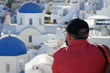 OIA, GREECE, 19 September 2018 Tourist takes photografies of the landscapes of Santorini, Cycladesのeditorial素材