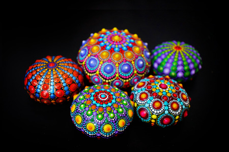 Beautiful mandala rocks on black backgroundの写真素材
