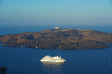 Panoramic view of the Caldera with cruise ship in Santorini, Greeceの写真素材