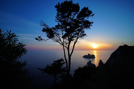 Very suggestive sunset in the island of Corfu in Greeceの写真素材