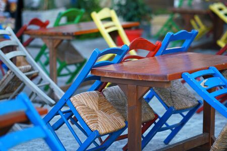 Rethymno, Greece, September 30 2018 Colored chairs in a restaurant in the old town of Rethymno