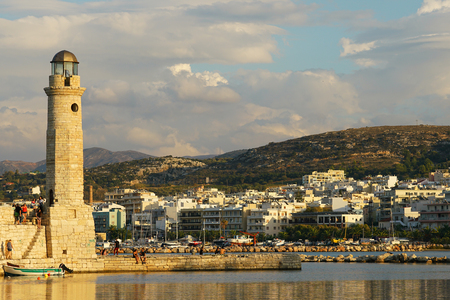 Rethymno, Greece, September 30 2018 View of the port of Rethymno and its lighthouse called Latarnia Morska at sunsetのeditorial素材