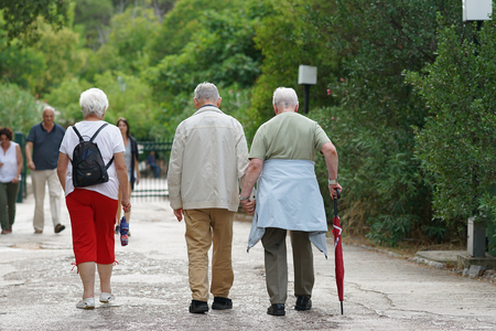 Epidaurus, Greece, October 4, 2019, Elderly tourists visiting the archaeological site of Epidaurusのeditorial素材